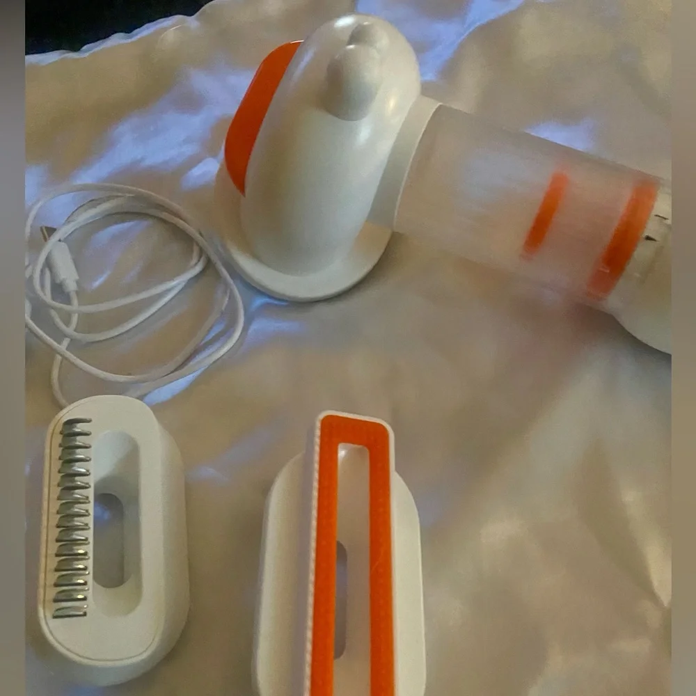NEW, in box, (never used) a pet (dog or cat) vacuum. Get rid of that pesky hair!